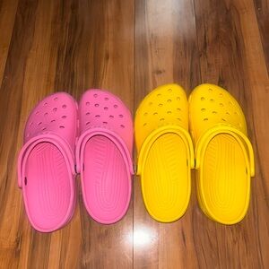 Yellow and pink crocs